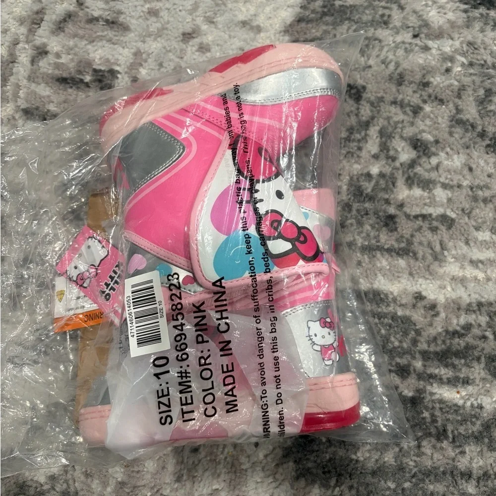 Hello Kitty pink light up snow boots size 8